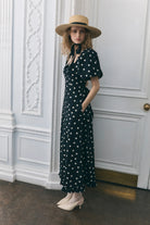 Queens of Archive Atlanta dress in black polka dot, puff-sleeve midi with sweetheart neckline