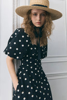 Bodice detail, ruched sweetheart neckline and gathered puff sleeves