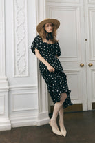 Hem and skirt detail, ruffled trim and floral lace tights styling
