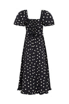 Back view, smocked back panel, bow ties at the waist and ruffle hem