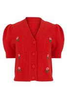 Front view, V-neck button placket and cable knit dotted with pink rosebuds