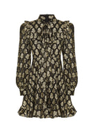 Front view, tie-neck bow, ruffled shoulder yoke and gathered cuffs on blouson sleeves