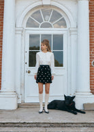 Wider view on the portico steps, collar and gathered balloon sleeve seen in profile