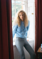 Queens of Archive Lucie cardigan in sky blue, brushed knit with puff shoulders and crystal buttons