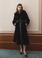 Queens of Archive Vivienne long coat in black, plush pile with fur collar, belted waist and gold snaps