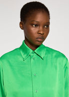 Collar detail, crinkled satin texture and tonal button placket