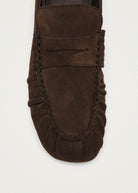 Close-up of the suede fringe and whipstitched seam