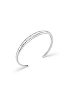 Orelia crystal starburst domed bangle in silver, open polished cuff with star-set crystals