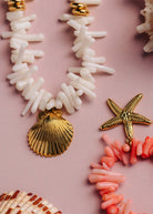 Alternative angle of the Cream Coral Chip and Shell Necklace, showing the bead pattern