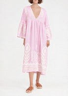 Greek Archaic Kori Feather midi dress in pale pink linen with gold peacock-feather embroidery