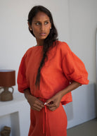 Lilly Pilly Leia linen top in spritz orange, balloon sleeves and drawstring hem