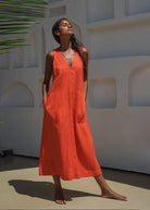 Lilly Pilly Iris linen midi dress in spritz orange, sleeveless V-neck with patch pockets