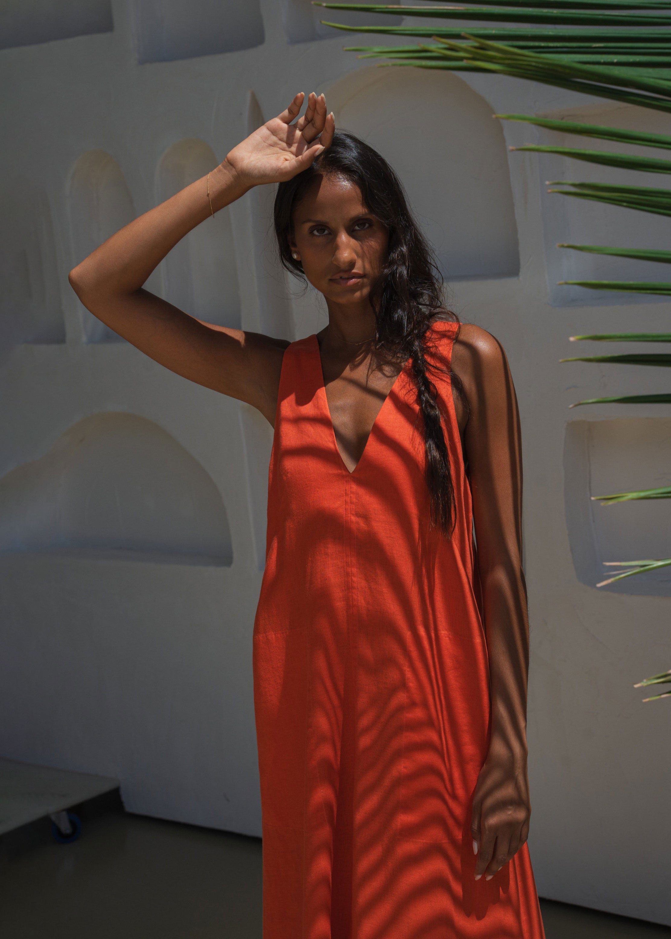 Lilly Pilly Close-up of palm leaf shadows falling across the V-neck bodice