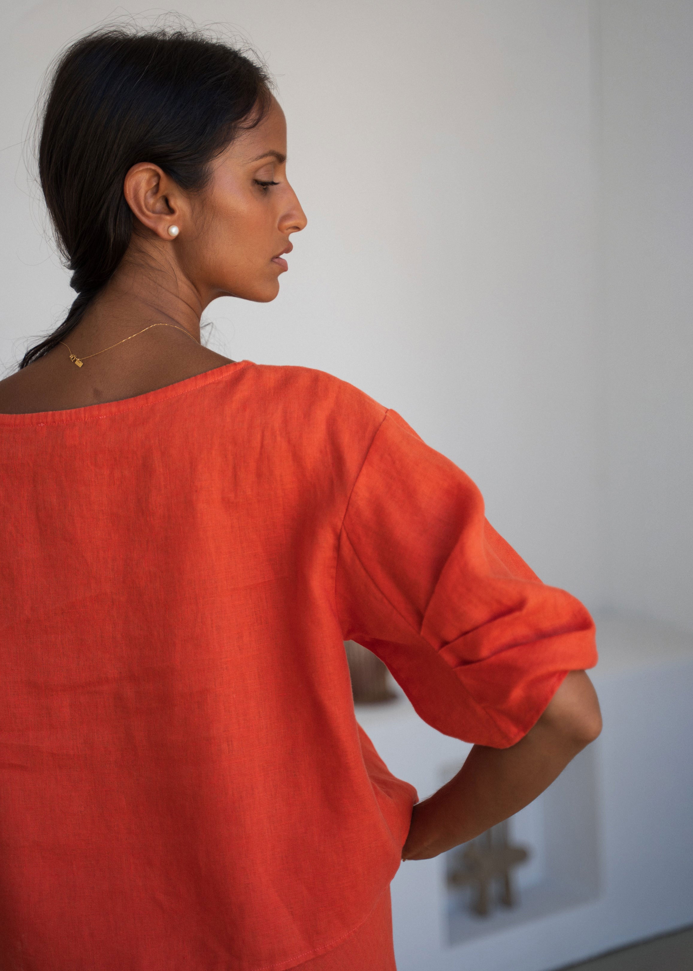 Lilly Pilly Three-quarter back showing the sleeve tuck detail