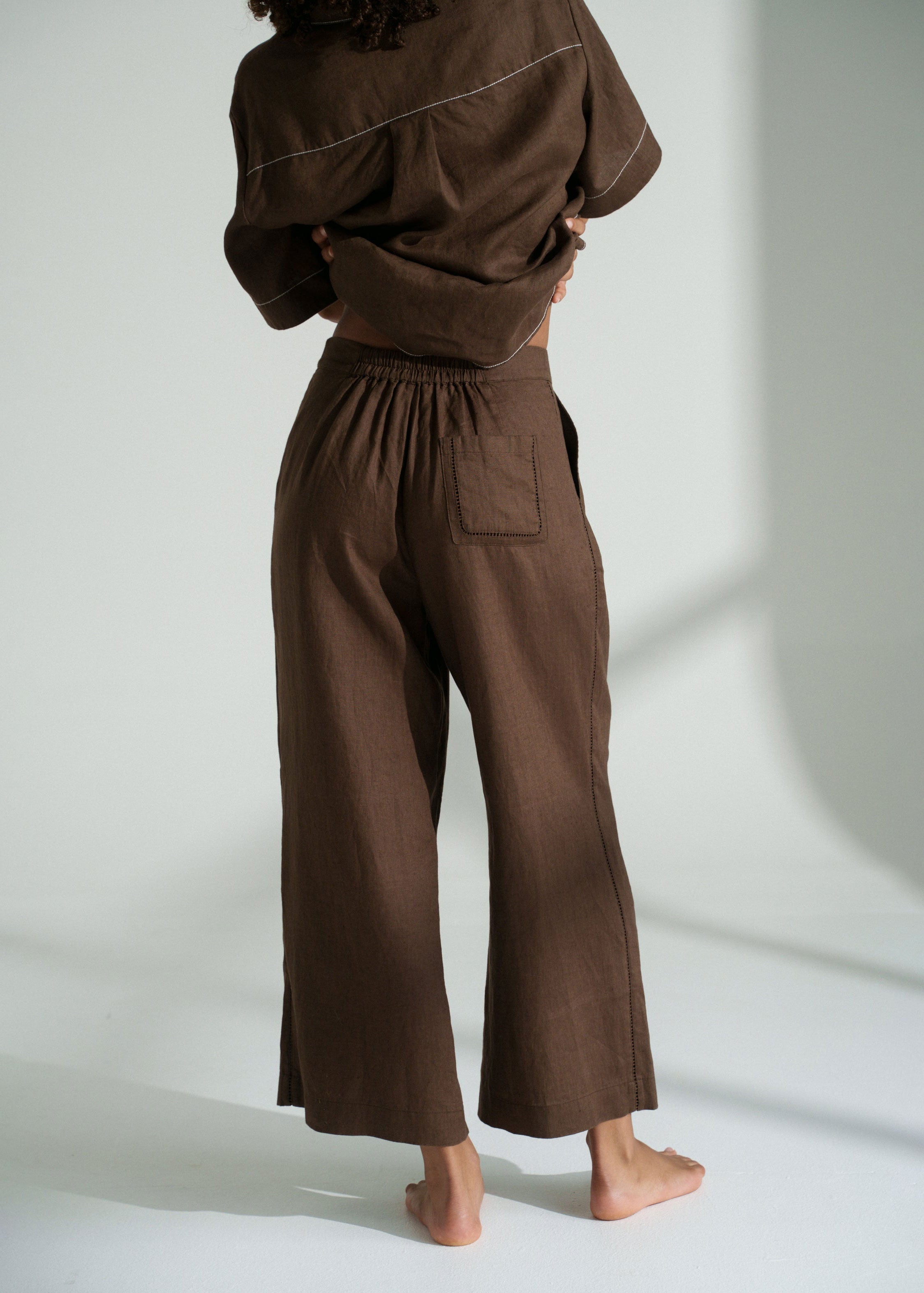 Lilly Pilly Back view, single patch pocket with ladder-stitch trim