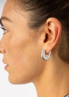 On-ear styling profile, showing the bold cuff-like proportion