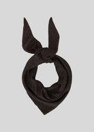 MSCH Copenhagen Shirley scarf in dark brown, silver lurex shimmer knotted into a bow shape