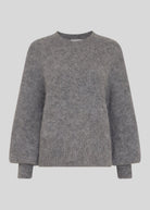 Flat front with round neck, gathered puff sleeves and ribbed cuffs