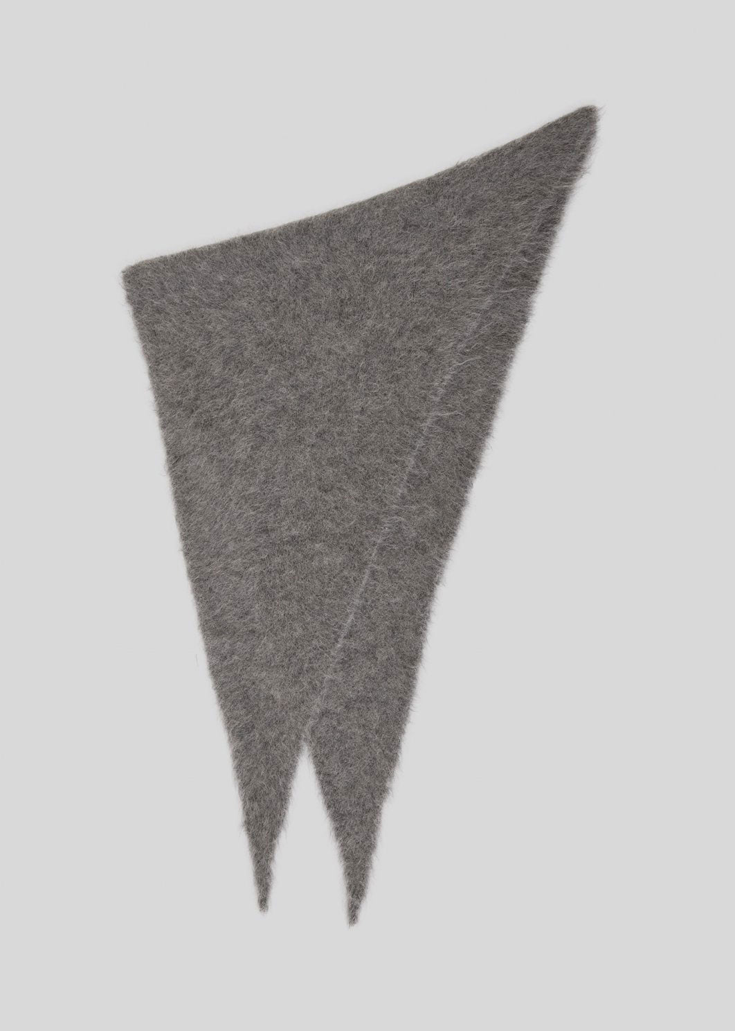 MSCH Copenhagen Laid flat to show the long asymmetric triangle shape and fluffy brushed texture