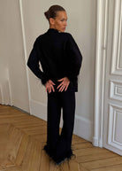 Side back angle with feathered cuffs and ankle hems