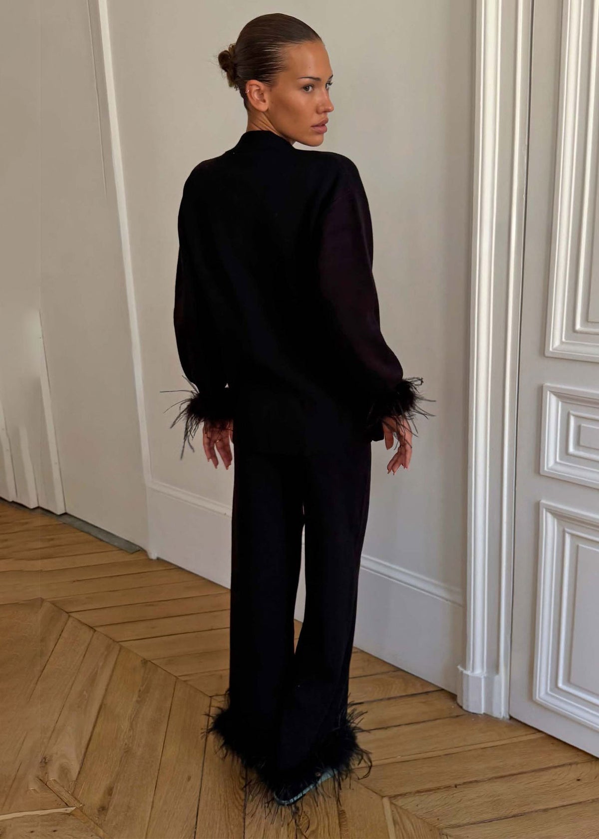 Never Fully Dressed Back view with high waisted fit and feather trimmed hems