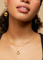 Side angle of the crab pendant on a fine gold chain