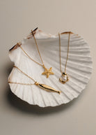 Alternate detail angle of the pearl and gold crab figure