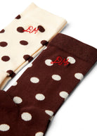 Close up of the ribbed cuffs with red DM initials on both socks