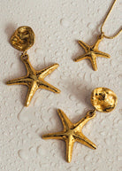 Coordinating LUXE starfish drop earrings shown alongside the necklace